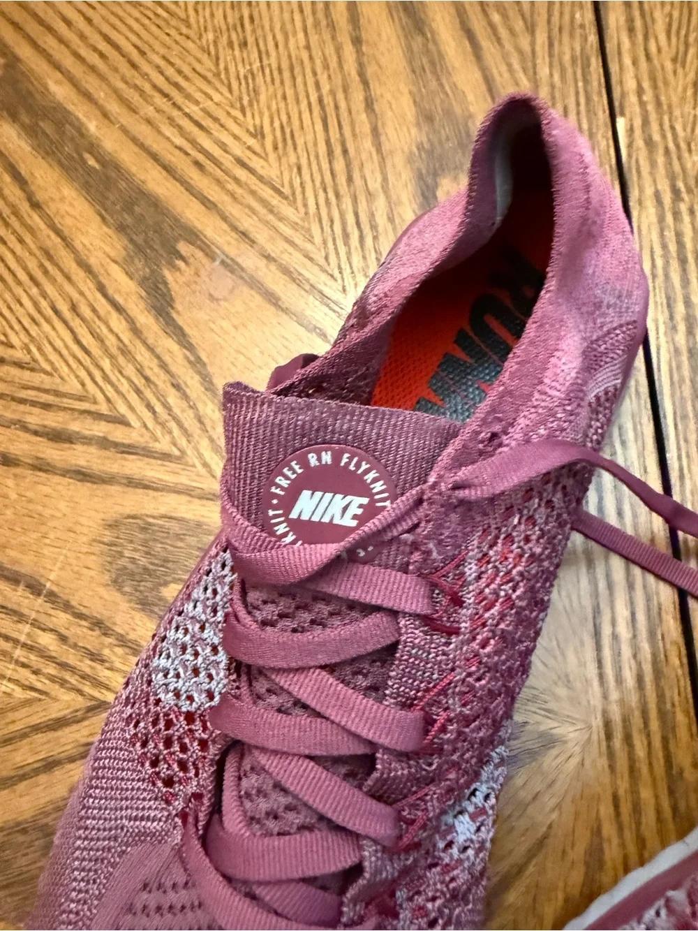 Nike Burgundy Knit Slip-On Sneakers with Bright Orange Insole